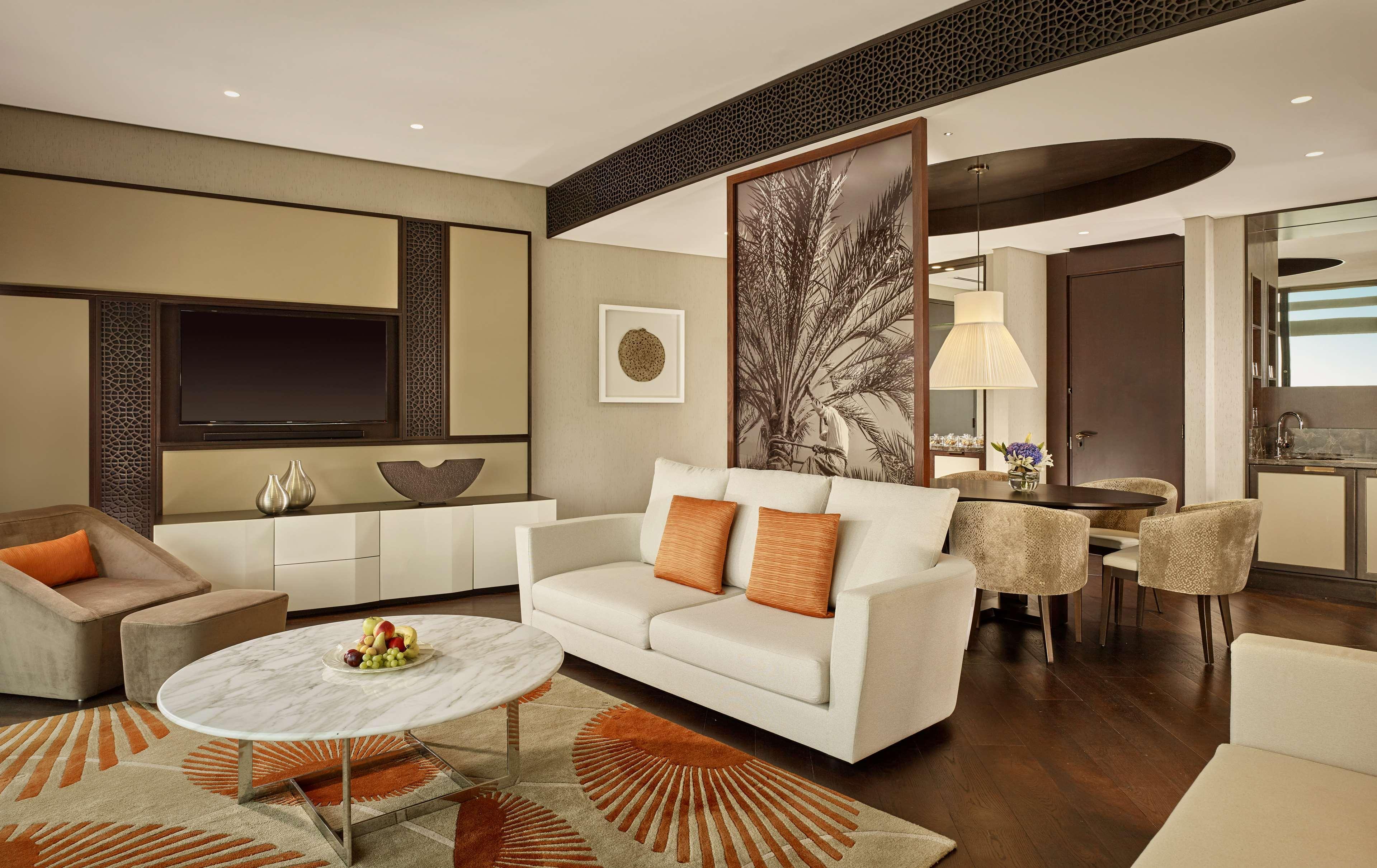 Grand Hyatt Abu Dhabi Hotel & Residences Emirates Pearl Bagian luar foto A living room in a suite at the Taj Mahal Palace, Mumbai